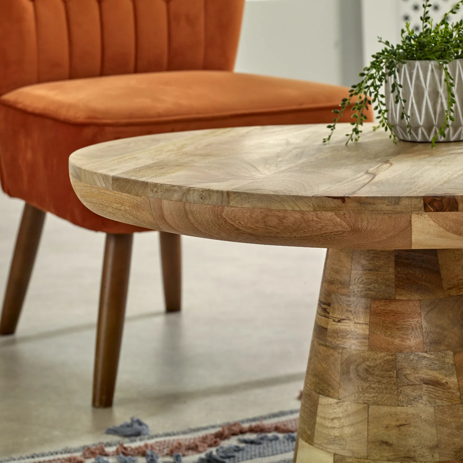 Dark wood store round end table